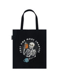 Front of tote has a skeleton wearing glasses reading a orange book with the phrase "Just One More Chapter" surrounding it's head on a black tote bag against a white background.