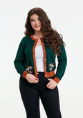Female model wearing the Leslie Mushroom Cardigan against a white background.