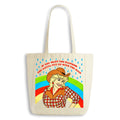 Tote bag with a graphic of Dolly Parton in a cowboy hat and rainbow, featuring text.