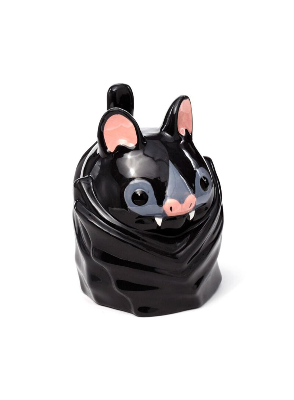 Black bat-shaped mug with pink accents on a white background