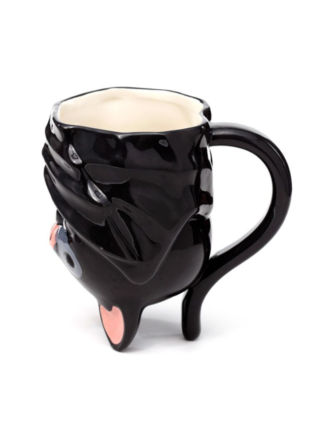 Back of bat shaped mug showing a large handle against a white background 