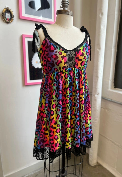 Front of dress at an angle on a white mannequin against a light background.