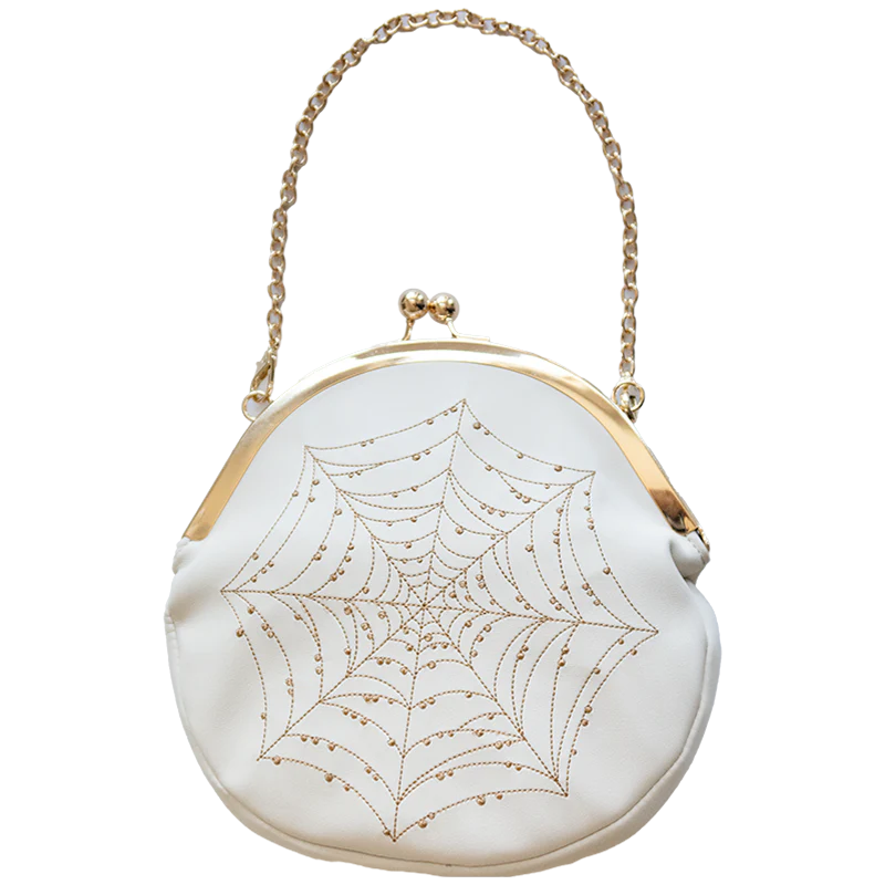 Front of purse against a white background. Front has a gold spiderweb on a white purse base