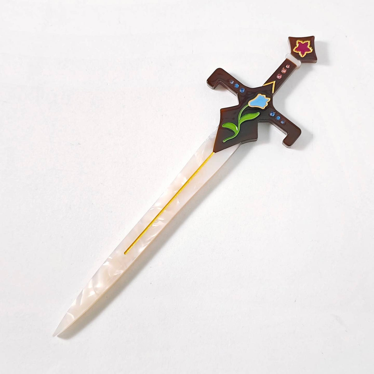 Cream hair sword with a brown hilt against a white background.