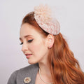 Model with hat on head, light background