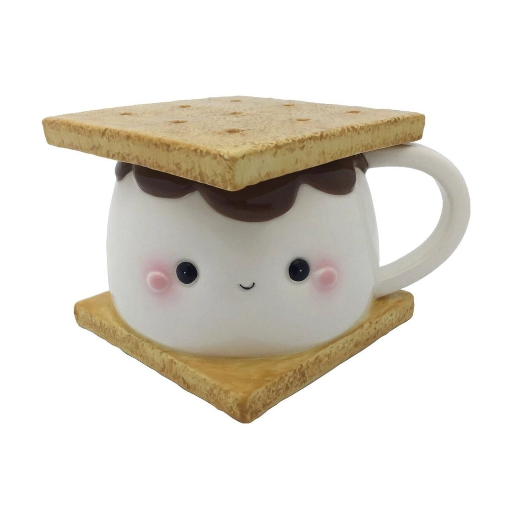 Mug is a large marshmallow with a kawaii face, chocolate on top of the marshmallow, and two graham crackers. Top graham cracker is the lid of the mug