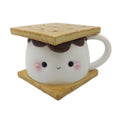 Mug is a large marshmallow with a kawaii face, chocolate on top of the marshmallow, and two graham crackers. Top graham cracker is the lid of the mug